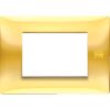 Nea - Placa Flexa en tecnopolímero de 3 plazas dorado brillante